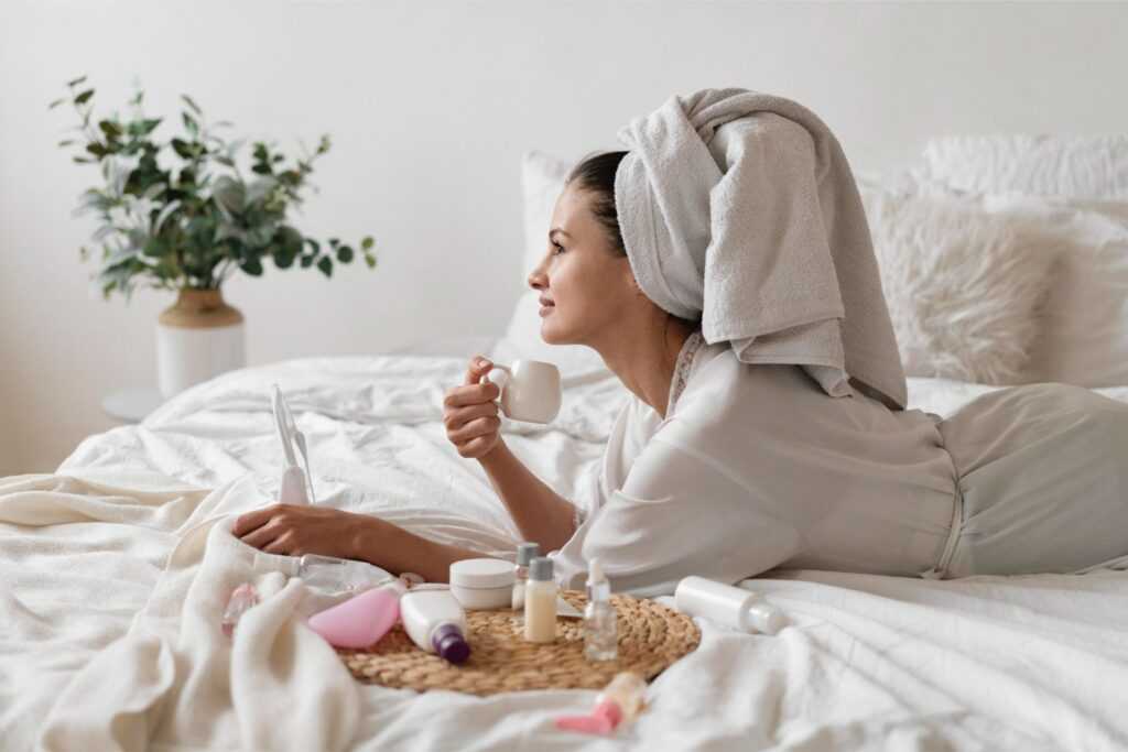 beautiful woman doing self care treatment indoors